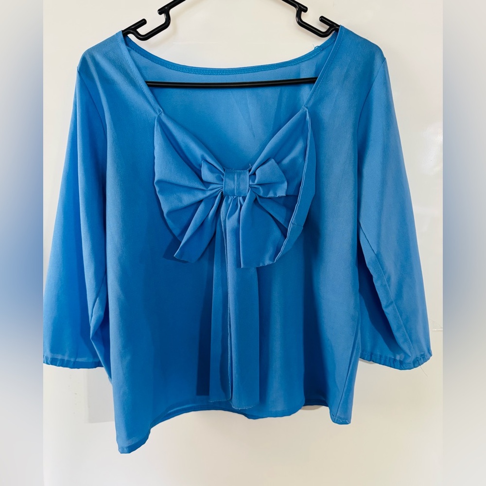 Blue 3/4 Sleeve Top with Bow in Back